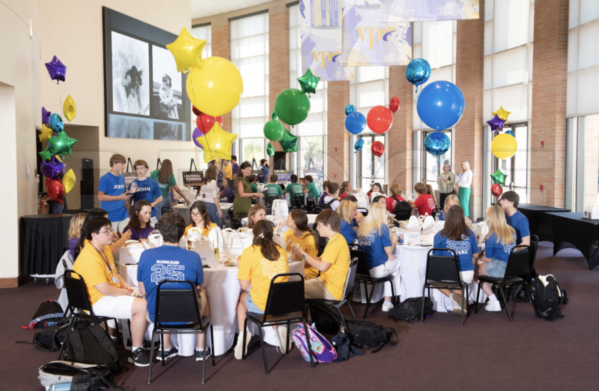 Students enjoy a lively senior lifer lunch, exchanging laughs and memories. The joy portrayed on their faces in this picture reflects the strong friendships that have been made over the years. This moment reflects the bond they have created and memories that will be cherished forever.  